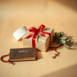 Wrapped Christian gift with cross ribbon beside a closed Bible on a neutral background