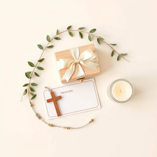 Ribboned keepsake box with rosary and prayer cards for a First Communion celebration