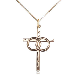 14kt Gold Wedding Rings Cross Medal
