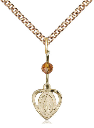 14kt Gold Miraculous Medal with a Topaz bead