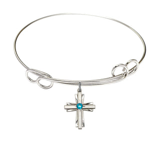 7 1/2 inch Round Double Loop Rhodium Bangle Bracelet with a Sterling Silver Cross charm.