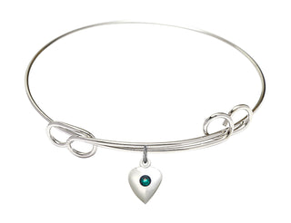 7 1/2 inch Round Double Loop Rhodium Bangle Bracelet with a Sterling Silver Heart charm.