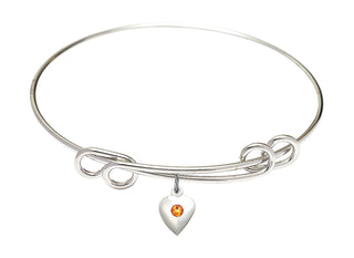 8 1/2 inch Round Double Loop Rhodium Bangle Bracelet with a Sterling Silver Heart charm.