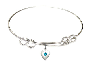8 1/2 inch Round Double Loop Rhodium Bangle Bracelet with a Sterling Silver Heart charm.