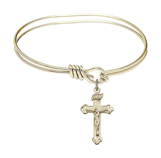 5 3/4 inch Oval Eye Hook Hamilton Gold Bangle Bracelet with a 14kt Gold Filled Crucifix charm.