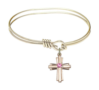 5 3/4 inch Oval Eye Hook Hamilton Gold Bangle Bracelet with a 14kt Gold Filled Cross charm.