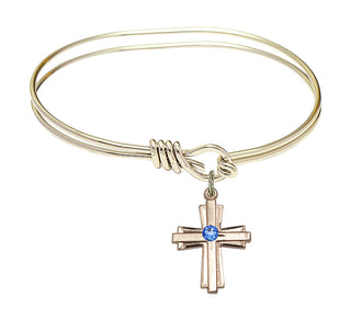 5 3/4 inch Oval Eye Hook Hamilton Gold Bangle Bracelet with a 14kt Gold Filled Cross charm.