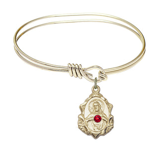 5 3/4 inch Oval Eye Hook Hamilton Gold Bangle Bracelet with a 14kt Gold Filled Scapular charm.