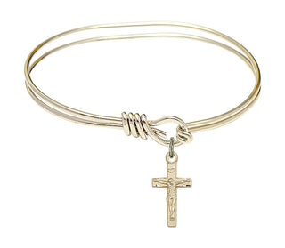 5 3/4 inch Oval Eye Hook Hamilton Gold Bangle Bracelet with a 14kt Gold Filled Crucifix charm.