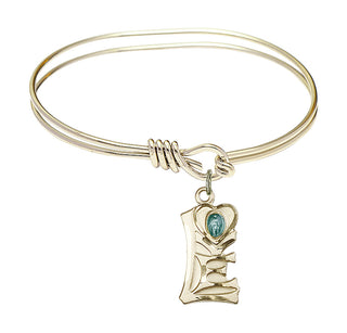 5 3/4 inch Oval Eye Hook Hamilton Gold Bangle Bracelet with a 14kt Gold Filled Miraculous charm.