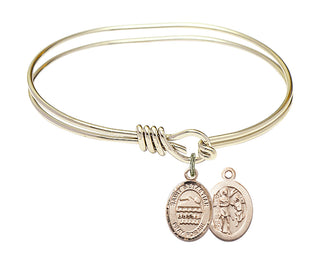 5 3/4 inch Oval Eye Hook Hamilton Gold Bangle Bracelet with a 14kt Gold Filled Saint Sebastian/Swimming charm.