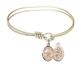 5 3/4 inch Oval Eye Hook Hamilton Gold Bangle Bracelet with a 14kt Gold Filled Saint Sebastian/Field Hockey charm.