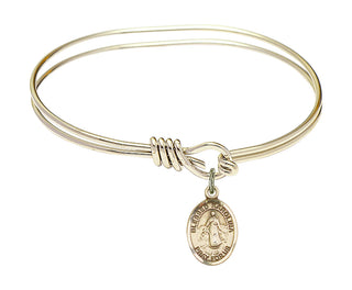 5 3/4 inch Oval Eye Hook Hamilton Gold Bangle Bracelet with a 14kt Gold Filled Blessed Karolina Kozkowna charm. Engraved Catholic Saint Jewelry