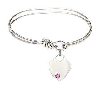 5 3/4 inch Oval Eye Hook Rhodium Bangle Bracelet with a Sterling Silver Heart charm. Engraved Catholic Saint Jewelry