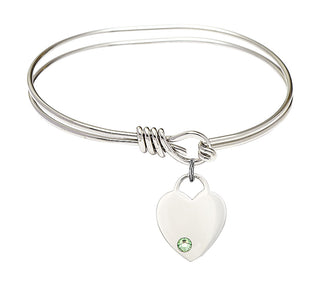 5 3/4 inch Oval Eye Hook Rhodium Bangle Bracelet with a Sterling Silver Heart charm. Engraved Catholic Saint Jewelry