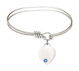 5 3/4 inch Oval Eye Hook Rhodium Bangle Bracelet with a Sterling Silver Heart charm. Engraved Catholic Saint Jewelry