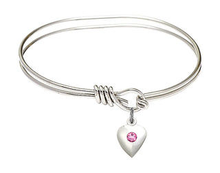 5 3/4 inch Oval Eye Hook Rhodium Bangle Bracelet with a Sterling Silver Heart charm.