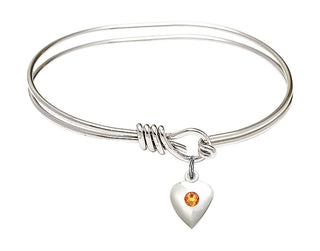 5 3/4 inch Oval Eye Hook Rhodium Bangle Bracelet with a Sterling Silver Heart charm.