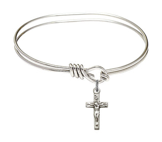 5 3/4 inch Oval Eye Hook Rhodium Bangle Bracelet with a Sterling Silver Crucifix charm.