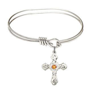 5 3/4 inch Oval Eye Hook Rhodium Bangle Bracelet with a Sterling Silver Cross charm. Engraved Catholic Saint Jewelry