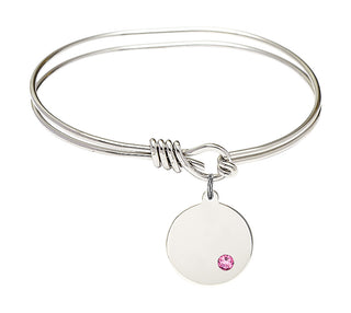 5 3/4 inch Oval Eye Hook Rhodium Bangle Bracelet with a Sterling Silver Plain Disc charm.