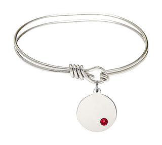 5 3/4 inch Oval Eye Hook Rhodium Bangle Bracelet with a Sterling Silver Plain Disc charm.