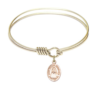 6 1/4 inch Round Eye Hook Hamilton Gold Bangle Bracelet with a 14kt Gold Filled Saint Pauline Visintainer charm. Engraved Catholic Saint Jewelry