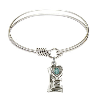 6 1/4 inch Round Eye Hook Rhodium Bangle Bracelet with a Sterling Silver Miraculous charm.
