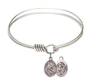 6 1/4 inch Round Eye Hook Rhodium Bangle Bracelet with a Sterling Silver Saint Sebastian/Surfing charm.