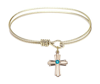 6 1/4 inch Oval Eye Hook Hamilton Gold Bangle Bracelet with a 14kt Gold Filled Cross charm.