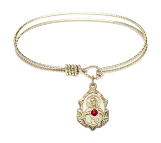 6 1/4 inch Oval Eye Hook Hamilton Gold Bangle Bracelet with a 14kt Gold Filled Scapular charm.