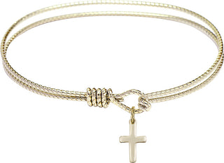 Bangle Bracelet with a Cross charm.