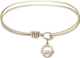 Bangle Bracelet with a Claddagh charm.
