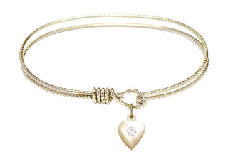 6 1/4 inch Oval Eye Hook Hamilton Gold Bangle Bracelet with a 14kt Gold Filled Heart charm.