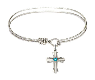 6 1/4 inch Oval Eye Hook Rhodium Bangle Bracelet with a Sterling Silver Cross charm.