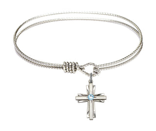 6 1/4 inch Oval Eye Hook Rhodium Bangle Bracelet with a Sterling Silver Cross charm.