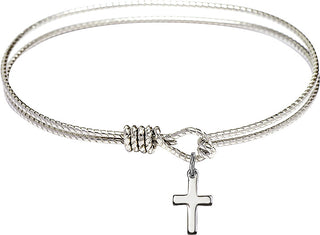 Bangle Bracelet with a Cross charm.