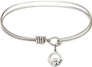 Bangle Bracelet with a Claddagh charm.