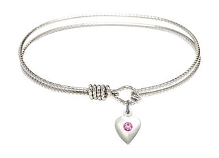 6 1/4 inch Oval Eye Hook Rhodium Bangle Bracelet with a Sterling Silver Heart charm.