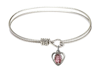 6 1/4 inch Oval Eye Hook Rhodium Bangle Bracelet with a Sterling Silver Miraculous charm.