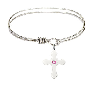 6 1/4 inch Oval Eye Hook Rhodium Bangle Bracelet with a Sterling Silver Cross charm.