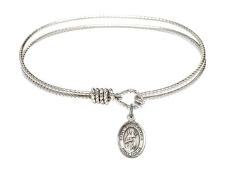 6 1/4 inch Oval Eye Hook Rhodium Bangle Bracelet with a Sterling Silver Saint Scholastica charm. Engraved Catholic Saint Jewelry