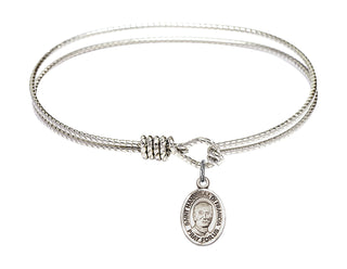 6 1/4 inch Oval Eye Hook Rhodium Bangle Bracelet with a Sterling Silver Saint Hannibal charm. Engraved Catholic Saint Jewelry