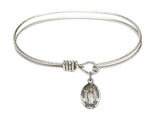 6 1/4 inch Oval Eye Hook Rhodium Bangle Bracelet with a Sterling Silver Saint Thomas A Becket charm. Engraved Catholic Saint Jewelry