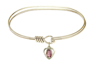 7 inch Oval Eye Hook Hamilton Gold Bangle Bracelet with a 14kt Gold Filled Miraculous charm.