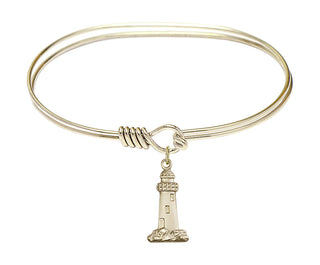 7 inch Oval Eye Hook Hamilton Gold Bangle Bracelet with a 14kt Gold Filled Lighthouse charm.