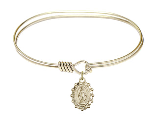 7 inch Oval Eye Hook Hamilton Gold Bangle Bracelet with a 14kt Gold Filled Miraculous charm.