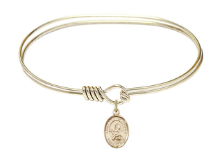 7 inch Oval Eye Hook Hamilton Gold Bangle Bracelet with a 14kt Gold Filled Saint Francis Xavier charm. Engraved Catholic Saint Jewelry