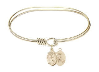 7 inch Oval Eye Hook Hamilton Gold Bangle Bracelet with a 14kt Gold Filled Saint Joseph of Cupertino charm.