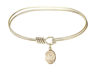 7 inch Oval Eye Hook Hamilton Gold Bangle Bracelet with a 14kt Gold Filled Saint Martha charm. Engraved Catholic Saint Jewelry